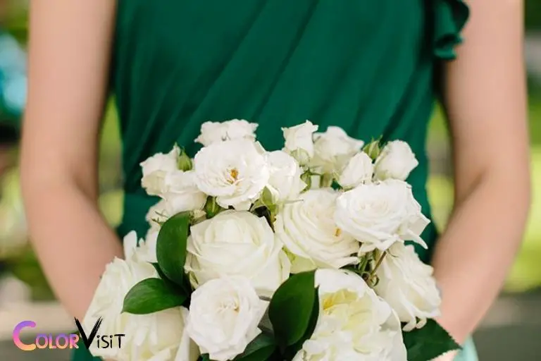what color flowers go with emerald green dress